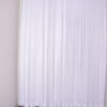 Cortina de voil liso c/ forro de microfibra off white 4,80x2,70 ilhós 28mm